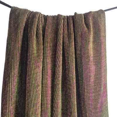 China Two Tone Color Metallic Green Fuchsia Iridescent Interlocking Sticky Knitted Fabric For Women's Skirt for sale