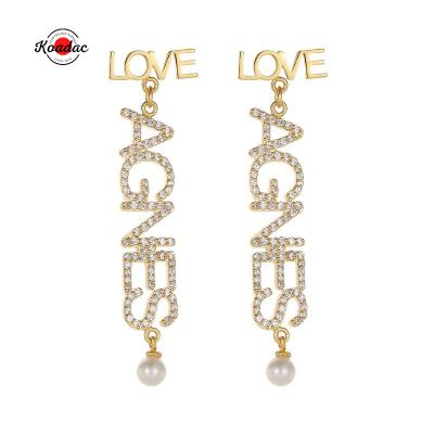 China TRENDY Fashion Hypoallergenic Gold Plated Custom Name Diamond Moissanite Earrings Waterproof Women Zircon Luxury Stud Earrings for sale