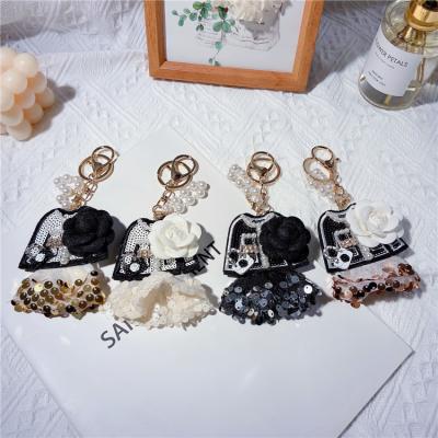 China Lilangda Car Fashion Key Chain Ring Ladies Bag Pendant Accessories Small Gifts New Eco-friendly Dress Skirt for sale