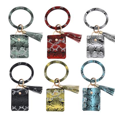 China Promotion Lilangda Women Leather Key Chain Coin Purs Ring Tassel Snake Skin Leather Key Holder Key Chain Bracelet Wristlet Wallets for sale