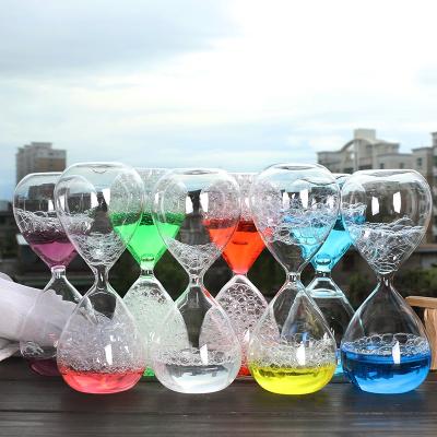 China Eco-friendly Creative Bubble Liquid Hourglass Multicolor Selected Light Yellow Blue Pink Valentine's Day Purple Green Colorful Liquid Hourglass for sale