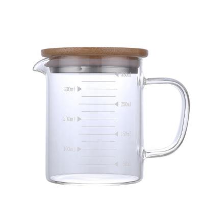 China Large Stocked Glass Jug 500ml Heat Resistant Measuring Cup With Scale for sale