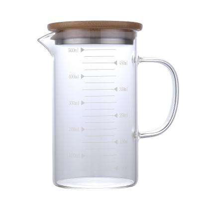 China Measuring cup stocked with handle borosilicate glass cup cooking tool for sale