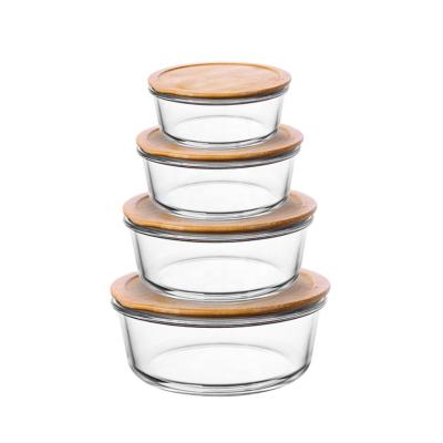 China Sustainable Glass Food Cans Kitchen Use Round Shape Glass Lunch Box Container With Bamboo Lid for sale