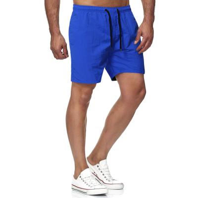 China Anti-wrinkle 2021 spring and summer new men's beach pants quick-drying casual shorts fashion printing five-point pants plus size for sale