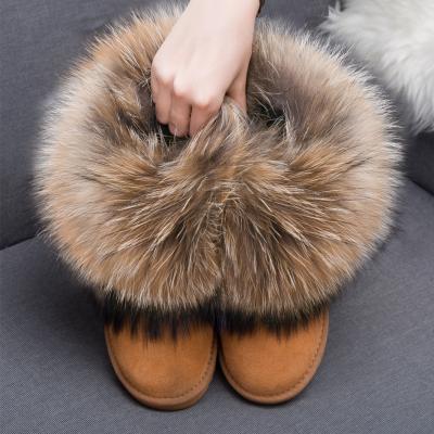 China Modern Fashion Trend Women Winter Raccoon Fur Boots Ladies Winter Snow Boots With Raccoon Fur Trim for sale