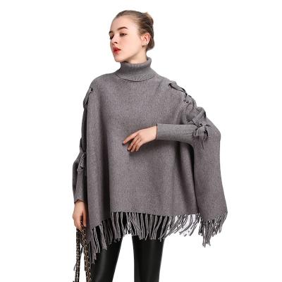 China Plus Size Women Fashion Soft Sweater Women Fashion Soft Sweater Poncho With Long Fringes Ladies Winter Ponchos for sale