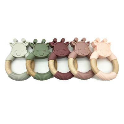 China New Safe Design Silicone and Wooden Teether Baby Teether and Wooden Baby Teether Toy for sale