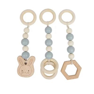 China Popular Decorative Wooden Chewable Rattle Teether Baby Ring Gift Play Newborn Gym Toys for sale