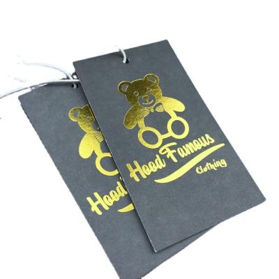 China Viable Custom Made Hang Paper Tag Labels Low Price Tag For Clothing Apparel Garment Hang Tags for sale