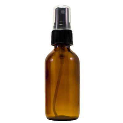 China Cosmetic 2 Ounce Amber Boston Round Glass Bottle with Fine Mist Sprayer for sale