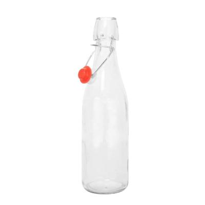 China Glass Beverage 500ml Fruit Juice Beverage Bottle With Swing Top for sale