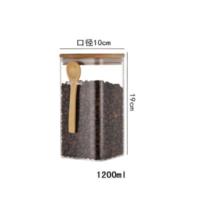 China 1200ml borosilicate glass food storage jar with bamboo lid for sale