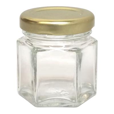 China 1.5oz Magnetic Food Hexagon Jars Hexagon Glass Spice Jars Empty Spice Jars for sale