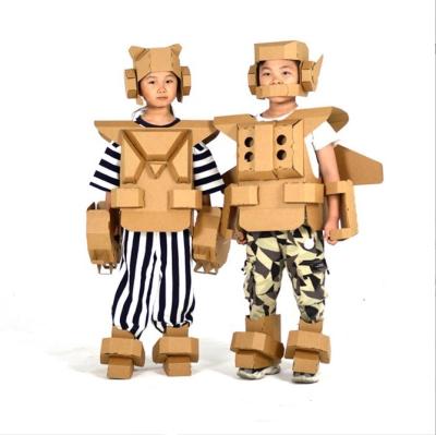 China Easy Assembly DIY Handmade Paper Box Clothes Dinosaur Cardboard Kids Performance DIY Cardboard Toy for sale