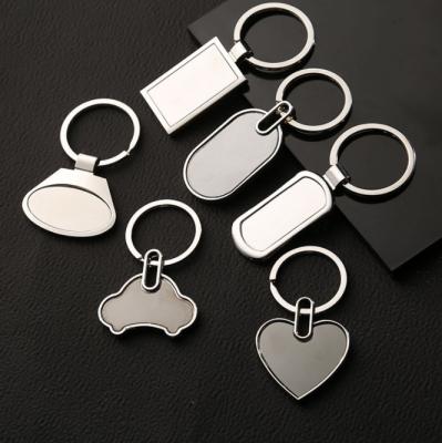 China Souvenir Stainless Steel Mute Key Chain Cutsomised Metal Laser Logo Blank Keychains for sale