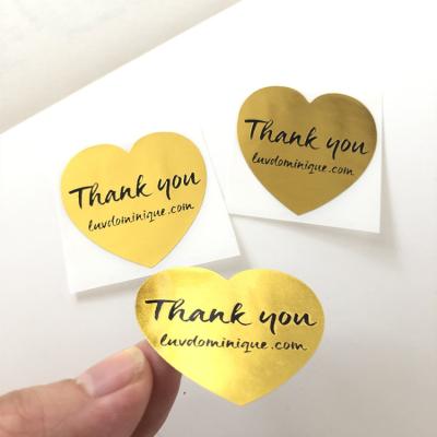 China Customized Printing Clear Stickers Waterproof Self Adhesive Logo Transparent Gold Foil Label for sale