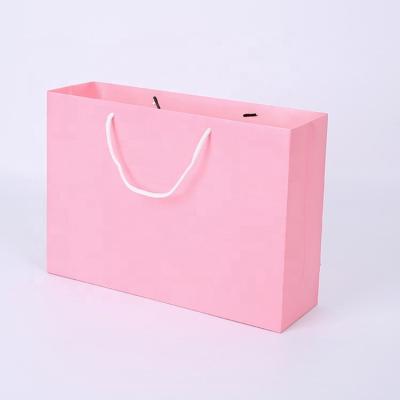 China Personalized Shopping Rose Custom Made Recyclable Art Paper Carrier Bags Luxury Boutique Gift Printed By Design for sale