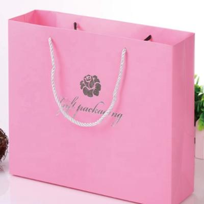 China Girls Recyclable Exquisite Custom Printing Pink Kraft Paper Bag For Dress for sale