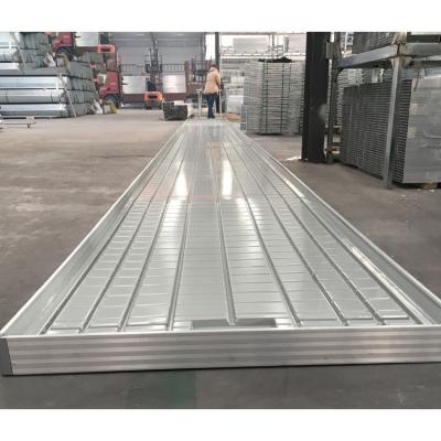 China Greenhouse Medicine Greenhouse Ebb And Flow Rolling Bench With Growing Trays Hydroponics Rolling Bench Table for sale