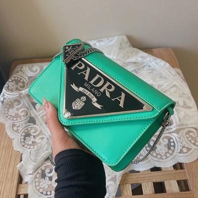 China Xiaofangbao 2023 new iron chain small square purse mobile phone bag triangle border iron bag for women and girls for sale