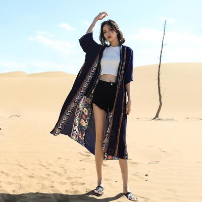 China Women Clothing 2021 Summer Fashion Seaside Beach Vacation Hot Selling Sexy Blouse Breathable With Long Cardigan Sun Protection Blouse for sale