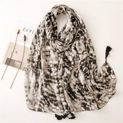 China Dobby Yellow Leopardskin Printing Long Scarf Navy Women Wrap Holiday Long Scarf With Tassel Casual Lady Black White Shawl for sale