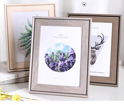 China Home Decoration Fashion Best Selling Custom Plastic Photo Frame For Home Decoration Gold Metal Photo Frame for sale