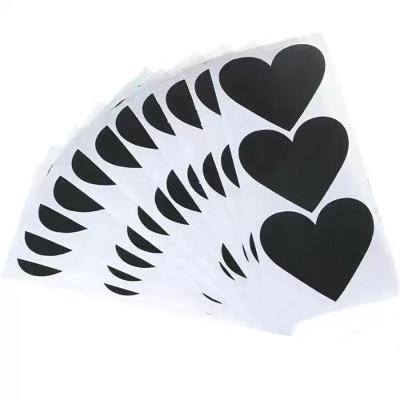 China Custom Printing Waterproof Black Heart Shape Vinyl Waterproof Label Sticker For Cup Shampoo Bottle for sale