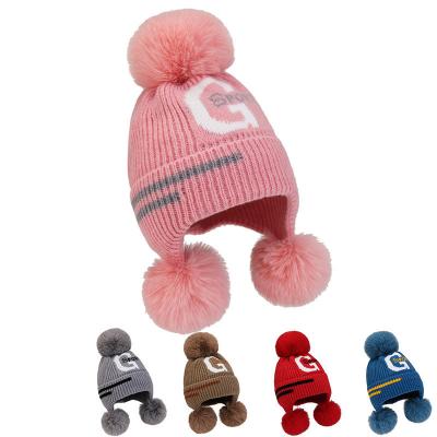 China COMMON unisex winter pom beanies custom embroidery slapped skullcap for men and women winter hats beanie for sale