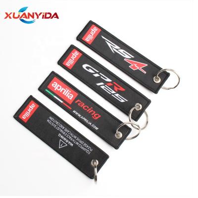 China Metal Woven Logo Label Aprilia Racing Motorcycle Key Chains for sale