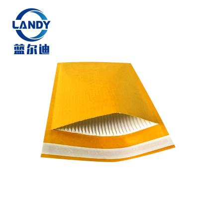 China Shock Resistance Gold Kraft Paper Air Bubble Film Envelope 5x7 Courier Messenger Bags for sale