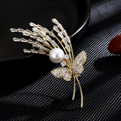 China Retro and modern New high grade pearl butterfly brooch microinset zircon brooch copper plated real gold manufacturers wholesale for sale