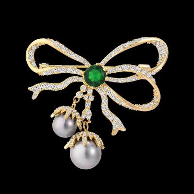 China Retro and modern New fashion bow zircon brooch female pearl jade brooch for sale