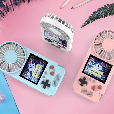 China 2021 New ABS Plastic 500 Bit Handheld Games 8 In 1 Classic Retro Games With Mini Fan for sale