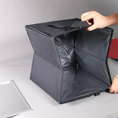 China Fold 30/40cm /50cm New Product Waterproof And Moistureproof Cloth Ideas Mini Portable Camera Shoot Photo Studio Led Lightweight Soft Box for sale