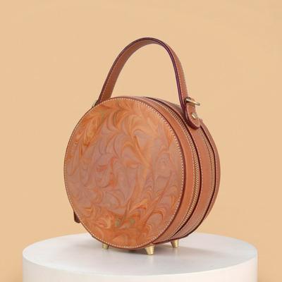 China Round New arrival designed women  genuine leather  round bag 2022 with tooling leather craft for ladies for sale