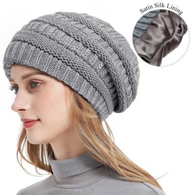 China COMMON COMMON Women's Satin Striped Beanie Hat Thick Winter Hats Knit Cable Beanies for sale