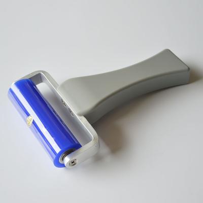 China Washable and Reusable Silicone Fiber Cleaning Sticky Roller Remove Dust for sale