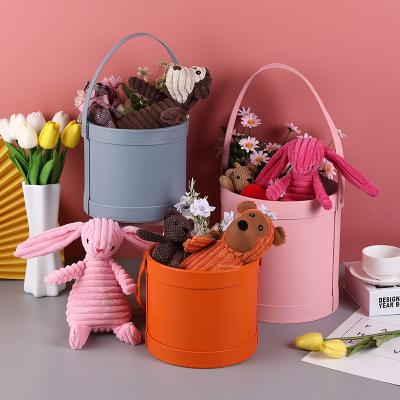 China Luxury Portable Leather Round Box Materials Recycled Advanced Advanced Creative PU Leather Holding Bucket Flower Box for sale