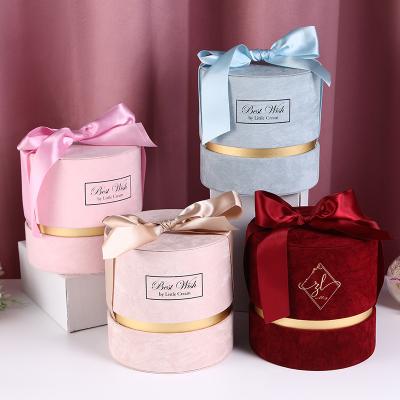 China Recycled Materials Gift Storage Box Barrel Shaped Bow Paper Packaging Boxes Christmas Custom Paper Box for sale