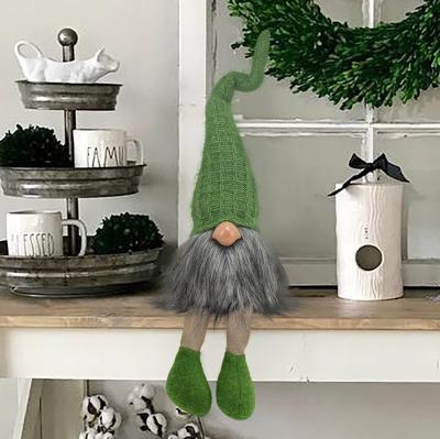 China Durable Customized Faceless Scandinavian Christmas Shelf Decor Navidad Doll Tomte Resting Hat Green Long Legged Knitted Gnomes For Xmas for sale