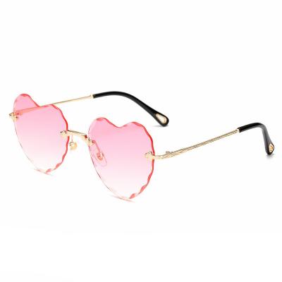 China 2022 New Rimless Love Gradient Color Peach Heart Sunglasses Women Shape Vintage Sun Glasses UV Protection Internet-Famous Glasses for sale