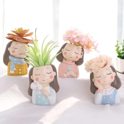 China New Custom Hand Painted Cute Cartoon Ceramic Girl Planter Planter Succulent Pot for sale