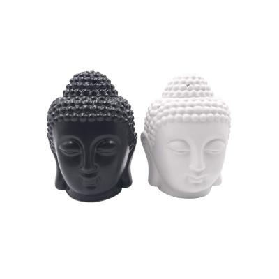 China European Essential White Black Head Buddha Head Theravada Oil Ceramic Aromatherapy Candle Holder for sale