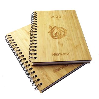 China Custom A5 Eco-friendy Logo Wooden Spiral Notebook Cover Spiral Bamboo Laser with Ball Pen for Gift Planner Diary 2022 for sale