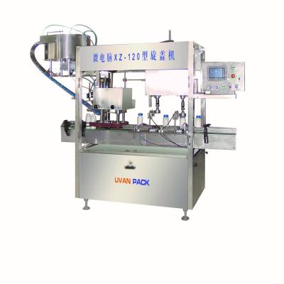 China New Microcomputer Oliver Oil Bottle Capping Machine State Food XZ-120 for sale