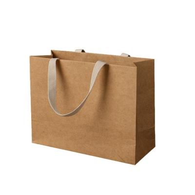 China Recyclable Cotton Kraft Paper Handle Brown Khaki Shopping Paper Bag For Garment for sale