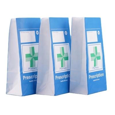 China Disposable Custom Logo Biodegradable Pharmacy Paper Bags for sale