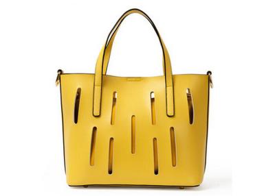 China Unique hollow design Fashion Ladies Handbags solid anti wear nail on bottom for sale